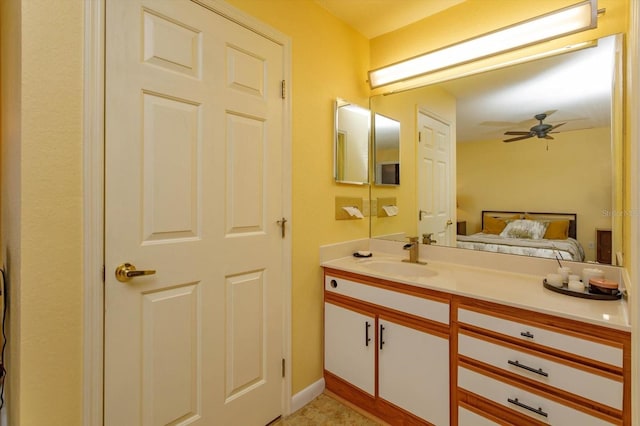 bathroom featuring ceiling fan and vanity