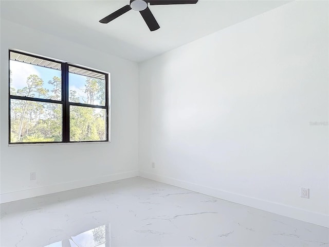 unfurnished room with ceiling fan