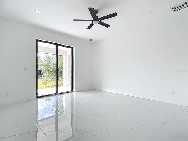 unfurnished room with ceiling fan