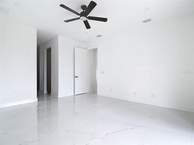 spare room featuring ceiling fan