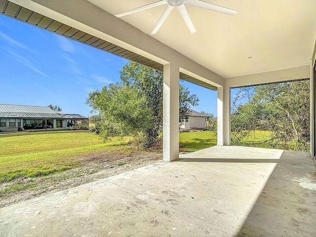 view of patio / terrace featuring ceiling fan