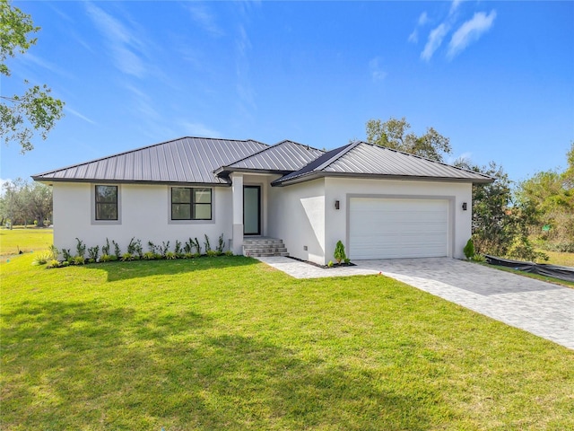 16760 Acapulco Rd, Punta Gorda, FL 33955 - view of front of property with stucco siding, a garage, decorative driveway, a metal roof, and a front yard