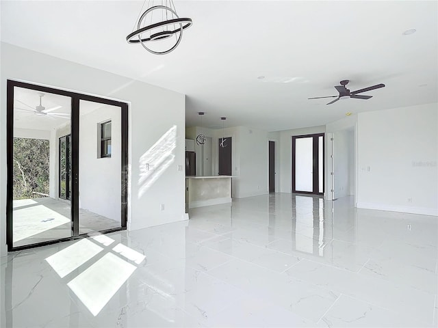 16760 Acapulco Rd, Punta Gorda, FL 33955 - empty room with ceiling fan and light marble finish floors