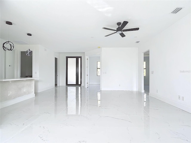 16760 Acapulco Rd, Punta Gorda, FL 33955 - unfurnished room featuring ceiling fan and light marble finish flooring