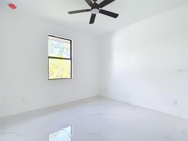 16760 Acapulco Rd, Punta Gorda, FL 33955 - spare room with a ceiling fan and light marble finish flooring