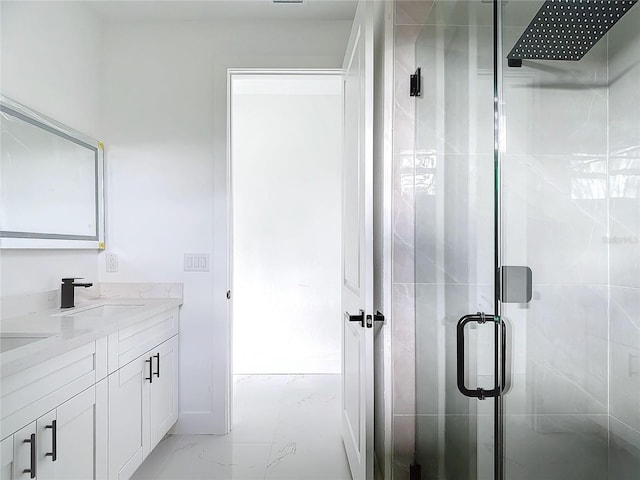 16760 Acapulco Rd, Punta Gorda, FL 33955 - bathroom with double vanity, a stall shower, and marble finish flooring
