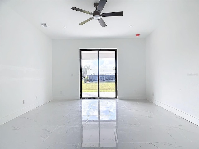 16760 Acapulco Rd, Punta Gorda, FL 33955 - spare room featuring light marble finish floors, ceiling fan, and recessed lighting