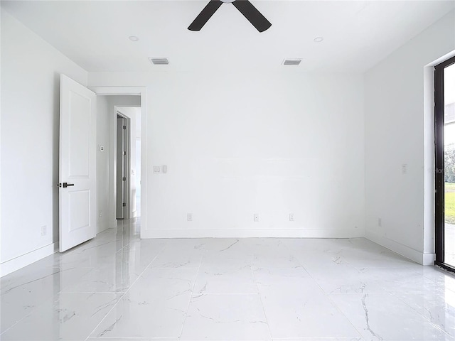16760 Acapulco Rd, Punta Gorda, FL 33955 - unfurnished room with ceiling fan and light marble finish floors