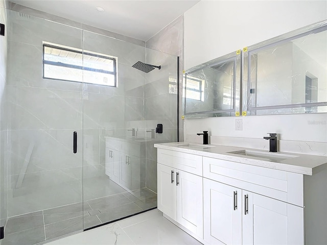16760 Acapulco Rd, Punta Gorda, FL 33955 - full bathroom with double vanity, a stall shower, and marble finish flooring