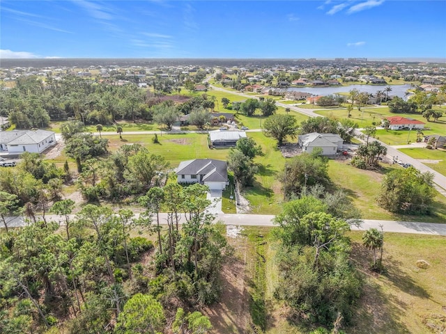 16760 Acapulco Rd, Punta Gorda, FL 33955 - aerial perspective of suburban area with a large body of water
