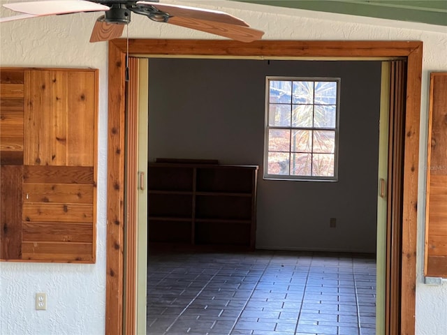 empty room featuring ceiling fan