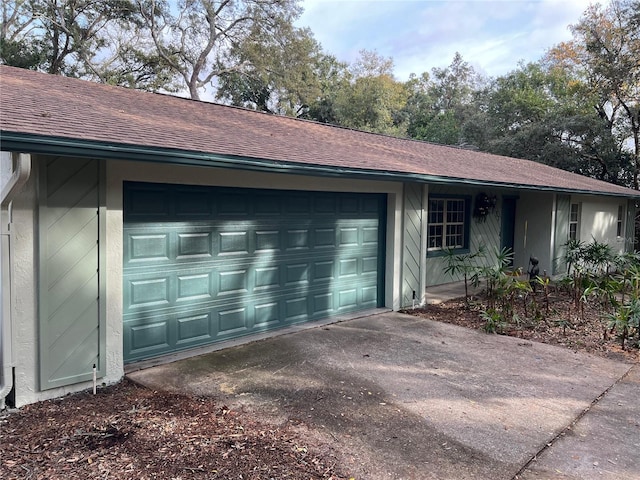 ranch-style home with a garage