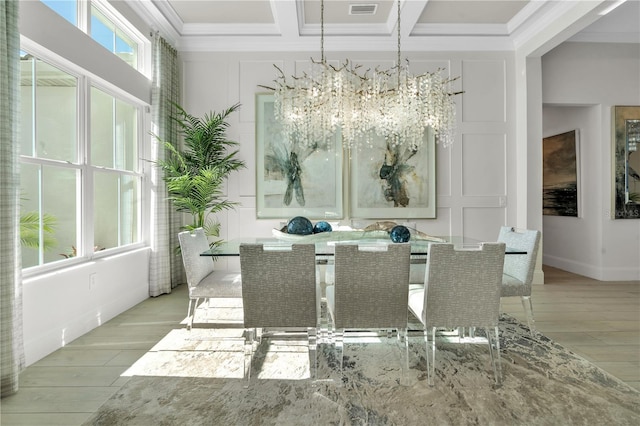 dining space featuring an inviting chandelier, coffered ceiling, light wood-type flooring, ornamental molding, and beamed ceiling