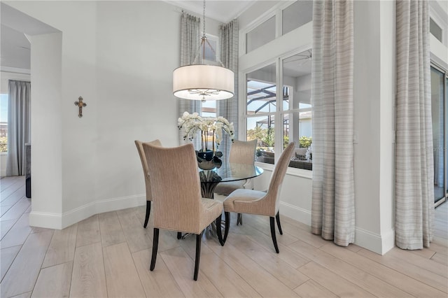 dining space featuring light hardwood / wood-style floors