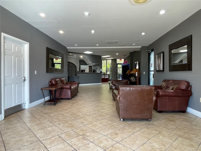 living room with light tile patterned floors