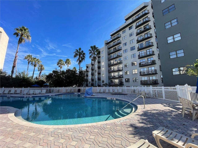 view of pool featuring a patio