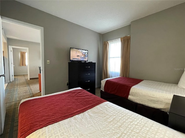 bedroom featuring a textured ceiling