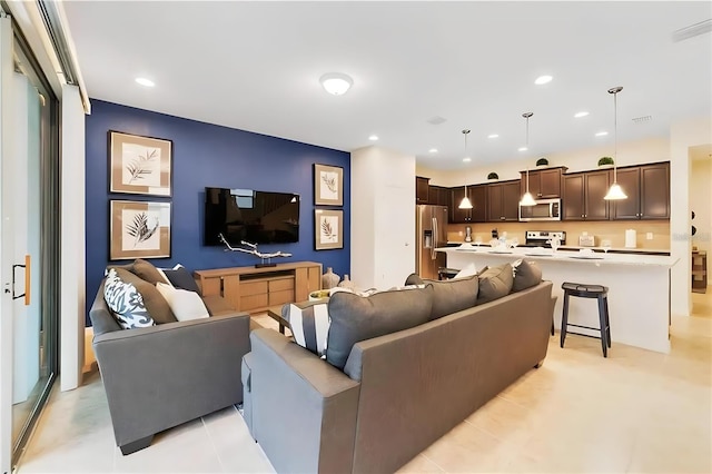 living room featuring plenty of natural light