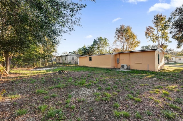 view of yard featuring ac unit