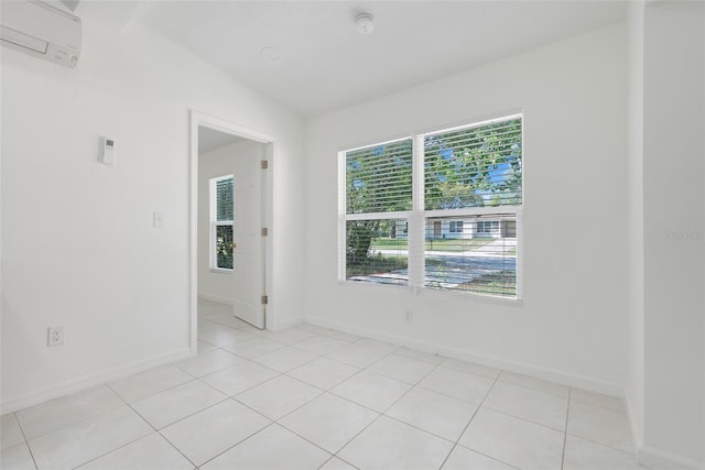 2341 Hadley St, Deltona, FL 32738 - unfurnished room with an AC wall unit, plenty of natural light, and baseboards
