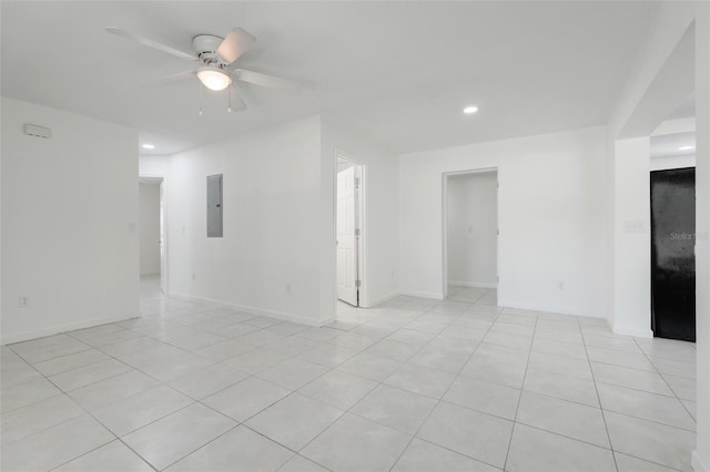 2341 Hadley St, Deltona, FL 32738 - unfurnished room with electric panel, a ceiling fan, recessed lighting, light tile patterned floors, and baseboards