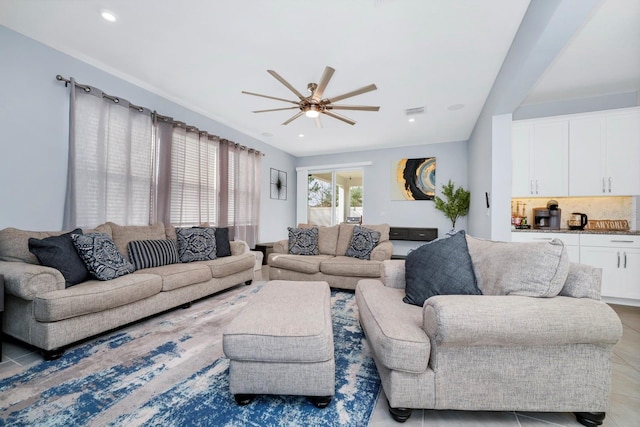 tiled living room featuring ceiling fan