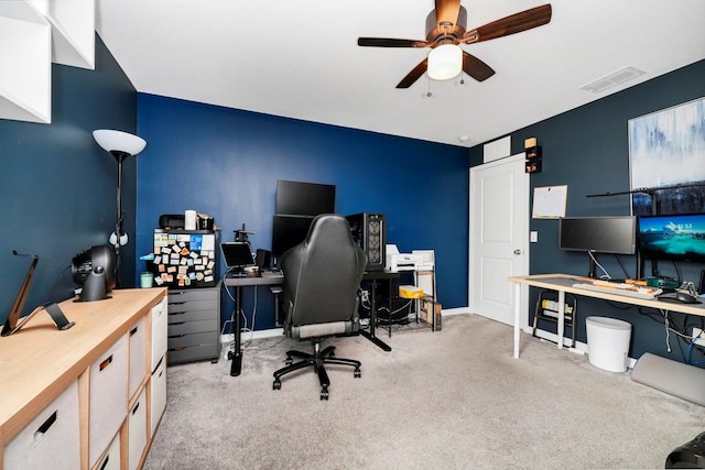 office with ceiling fan and light colored carpet