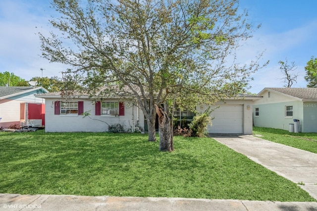 ranch-style home with concrete driveway, an attached garage, and a front lawn