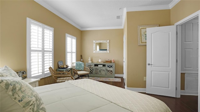 bedroom featuring dark hardwood / wood-style flooring and crown molding