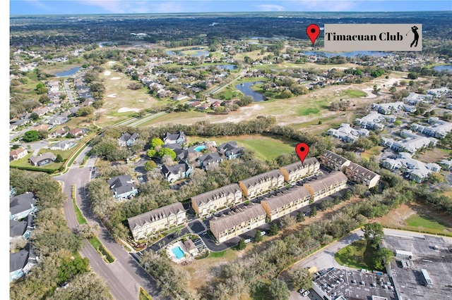 bird's eye view with a residential view and a water view