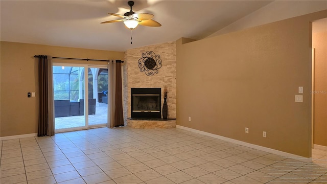 unfurnished living room featuring a large fireplace, ceiling fan, light tile patterned flooring, and vaulted ceiling