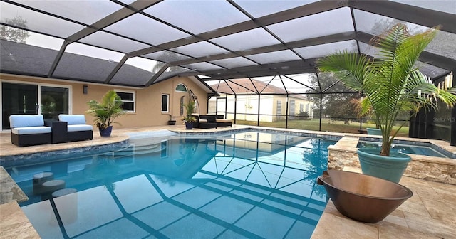 view of pool with an outdoor hangout area, a patio area, and a lanai