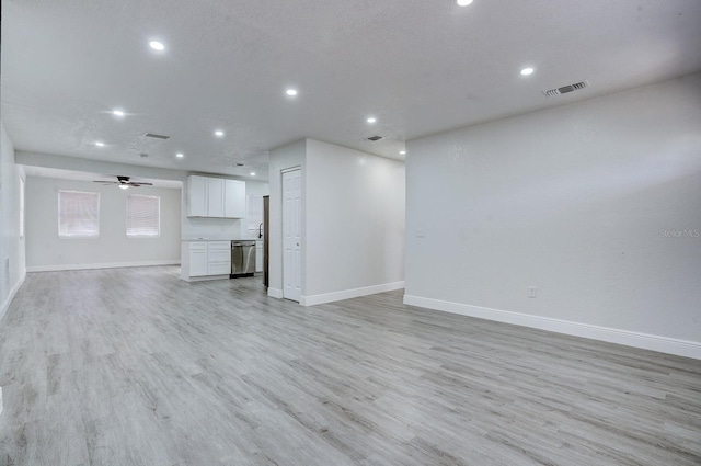 unfurnished living room with light hardwood / wood-style flooring