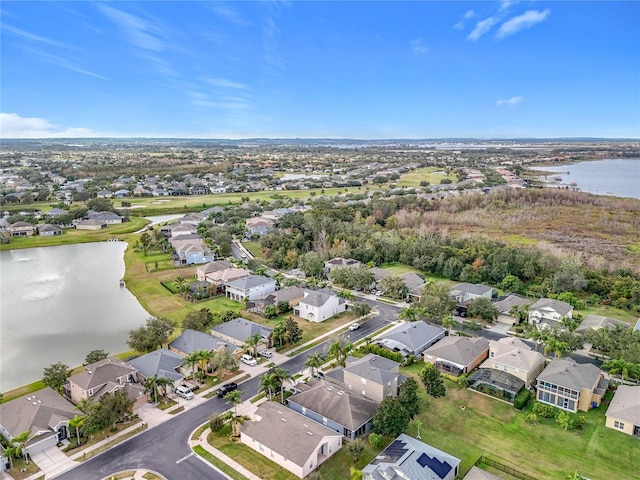 drone / aerial view with a water view