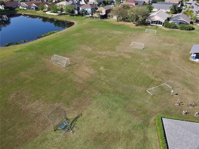 drone / aerial view with a water view