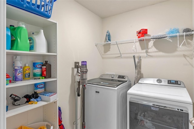 washroom featuring separate washer and dryer