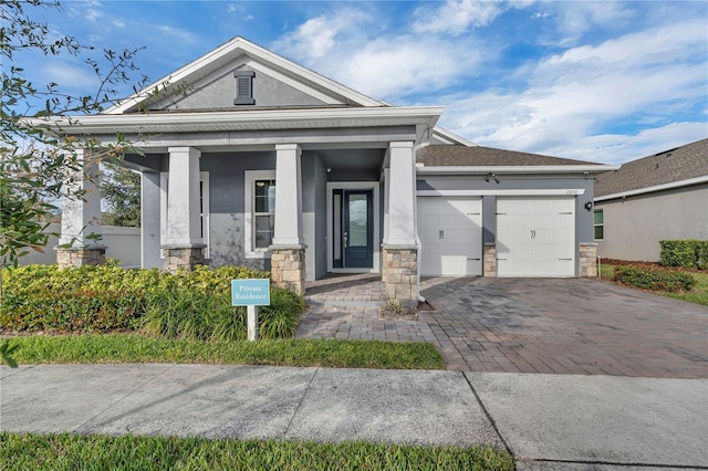 view of front of home with a garage