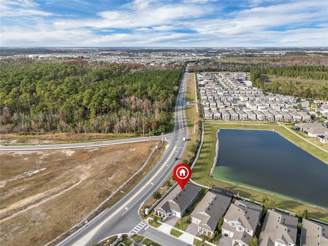 drone / aerial view with a water view