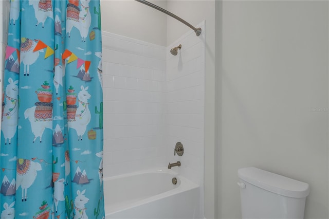 bathroom with toilet and shower / tub combo