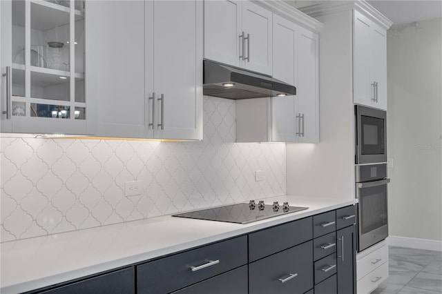 kitchen featuring backsplash, stainless steel oven, black electric cooktop, built in microwave, and white cabinets