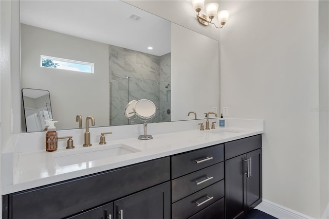 bathroom featuring vanity and a shower with door