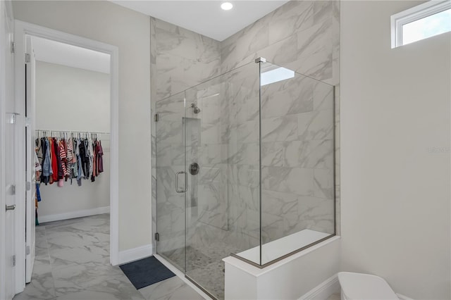 bathroom featuring an enclosed shower