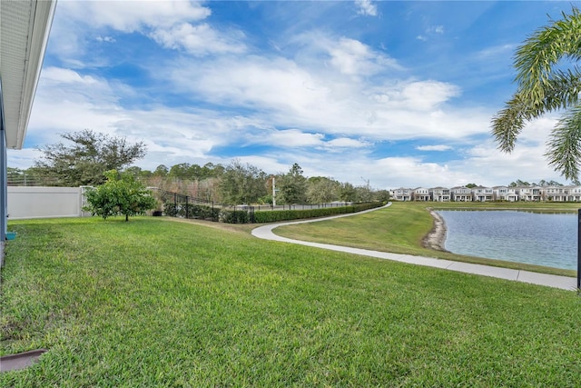 view of yard with a water view