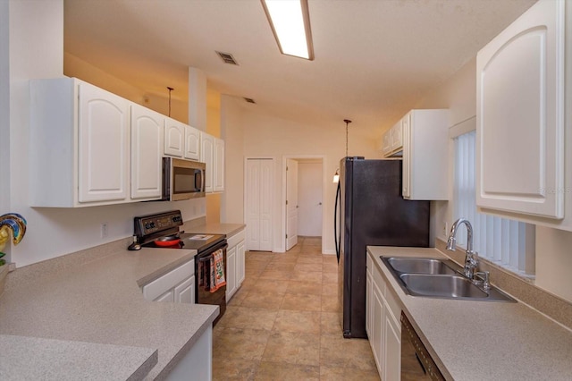 kitchen featuring vaulted ceiling, sink, black appliances, white cabinetry, and hanging light fixtures