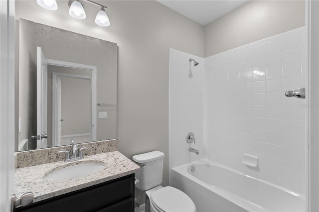 full bathroom featuring shower / bathing tub combination, vanity, and toilet