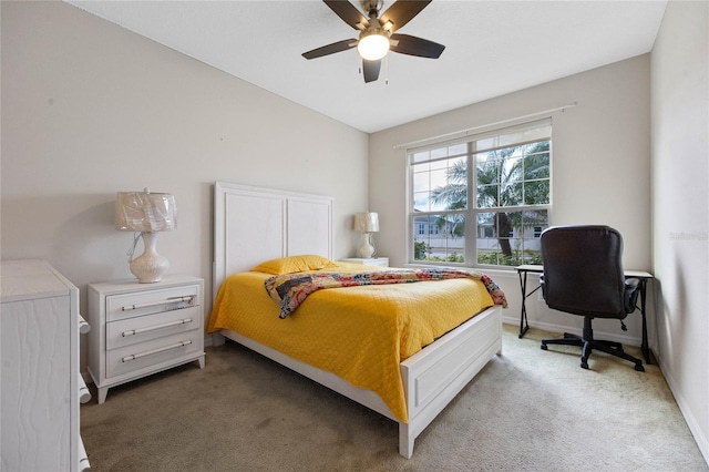 bedroom with carpet flooring, ceiling fan, and vaulted ceiling