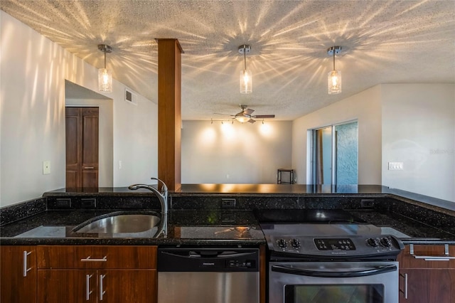 kitchen with ceiling fan, stainless steel appliances, hanging light fixtures, and sink