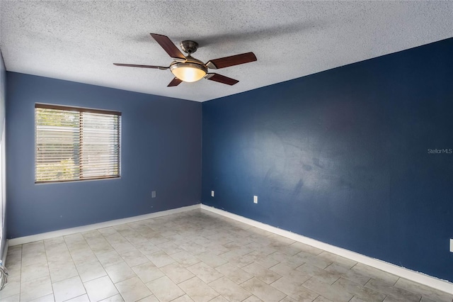 unfurnished room with a textured ceiling and ceiling fan