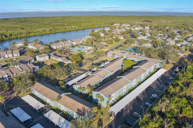 bird's eye view with a water view