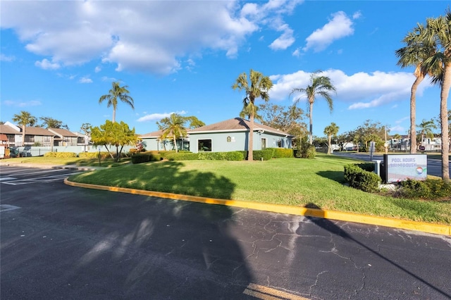 view of front of home with a front lawn